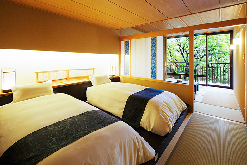 温泉旅館界 鬼怒川の客室のベッド