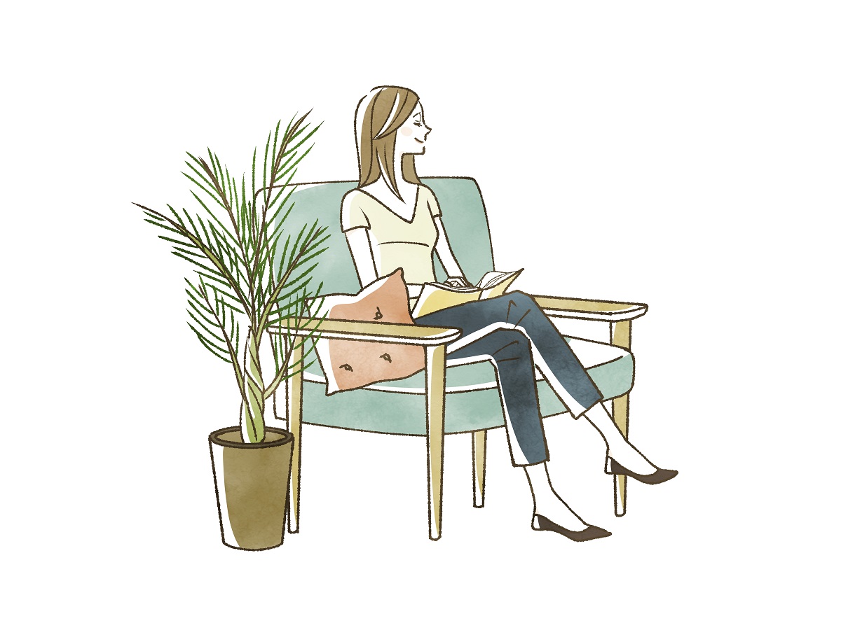 ソファに座って本を読みながらリラックスしている人のイラスト