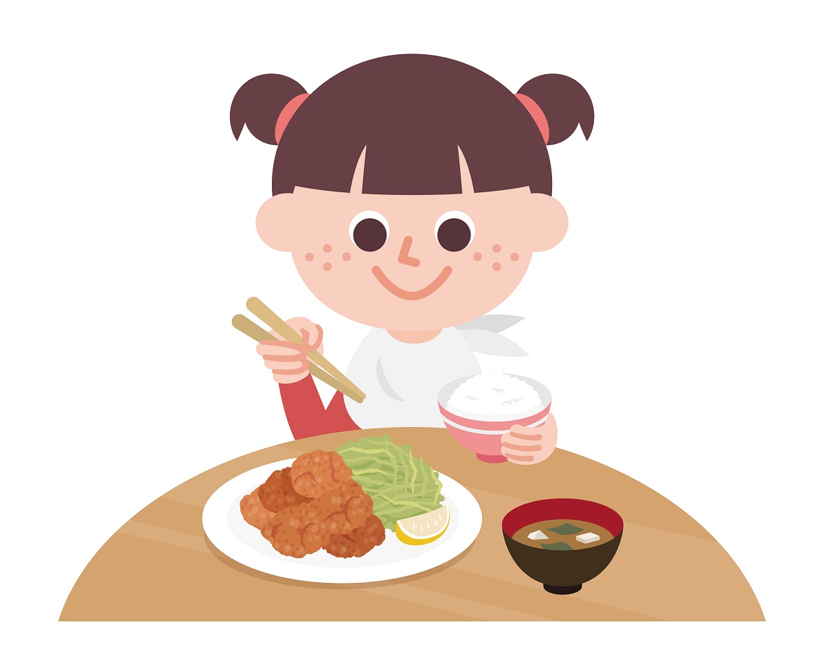 食事中の子供のイメージイラスト