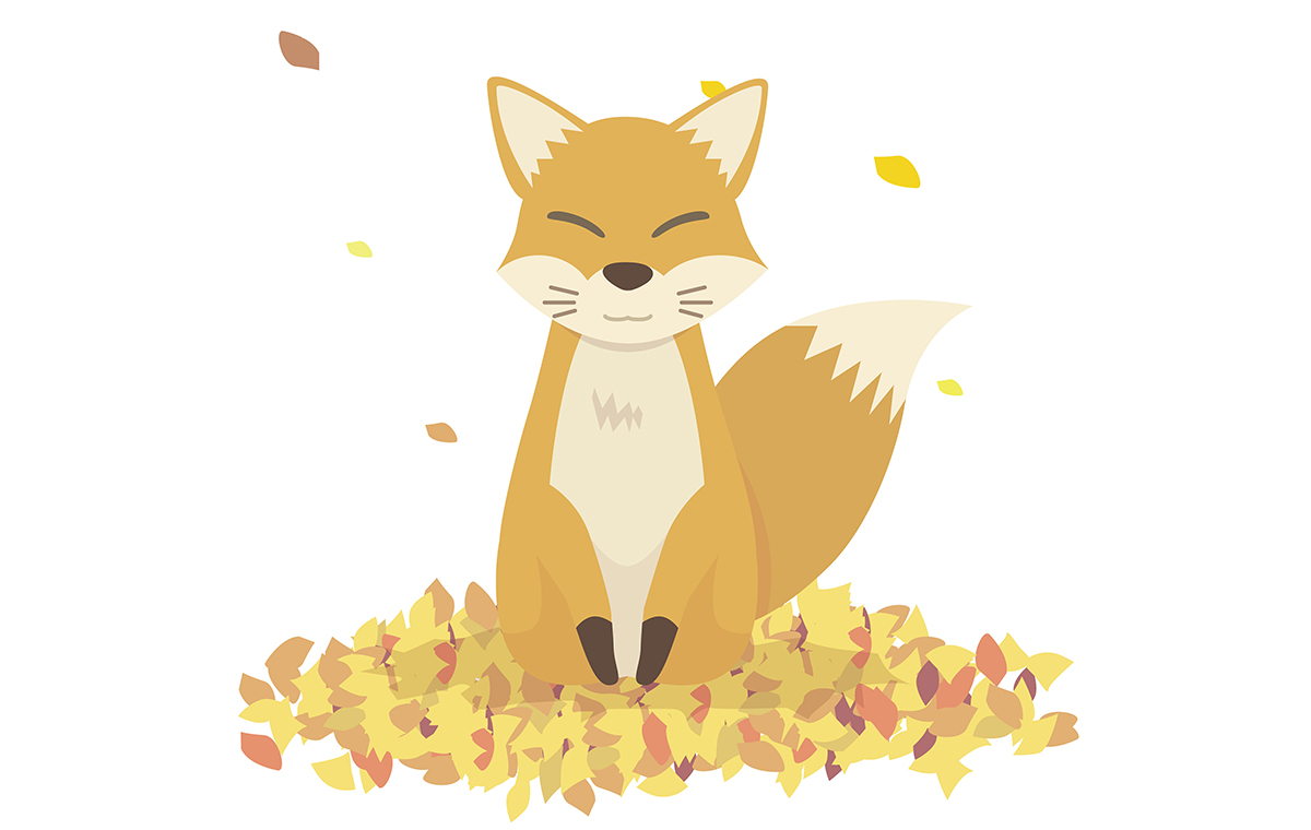 落ち葉の上に座る狐のイラスト
