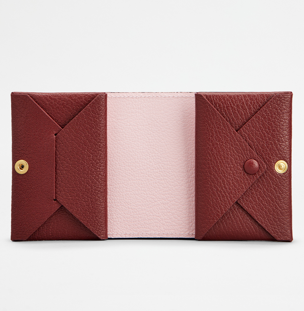トッズのピンクと赤のミニ財布、開いた写真