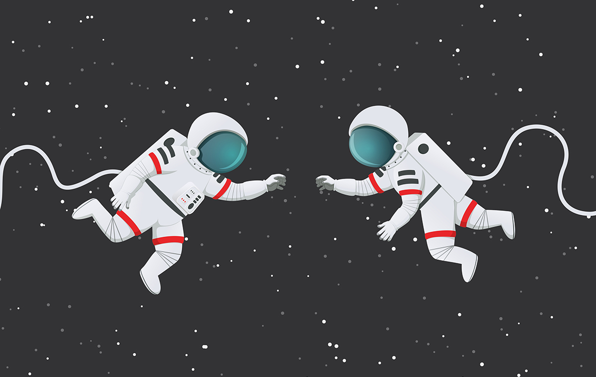 宇宙遊泳する2人の宇宙飛行士
