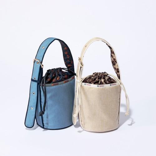 ▲MED Belt DRAWST Tote￥31,900 カラー：Ecru Moon Raffia、Cosmic Sky Denim