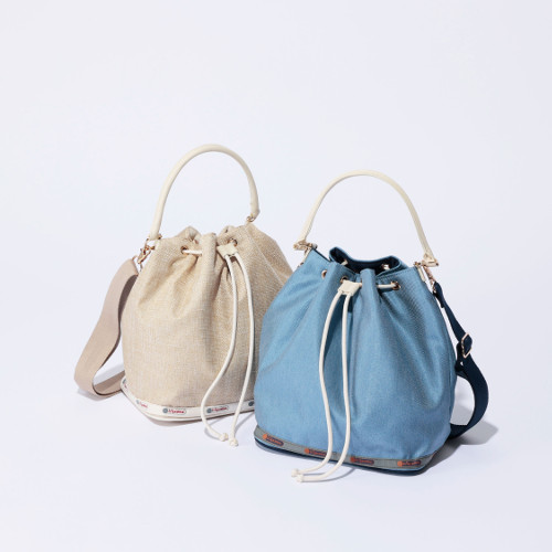 ▲MED Drawstring Bag￥30,800 カラー：Ecru Moon Raffia、Cosmic Sky Denim