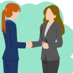 握手する女性