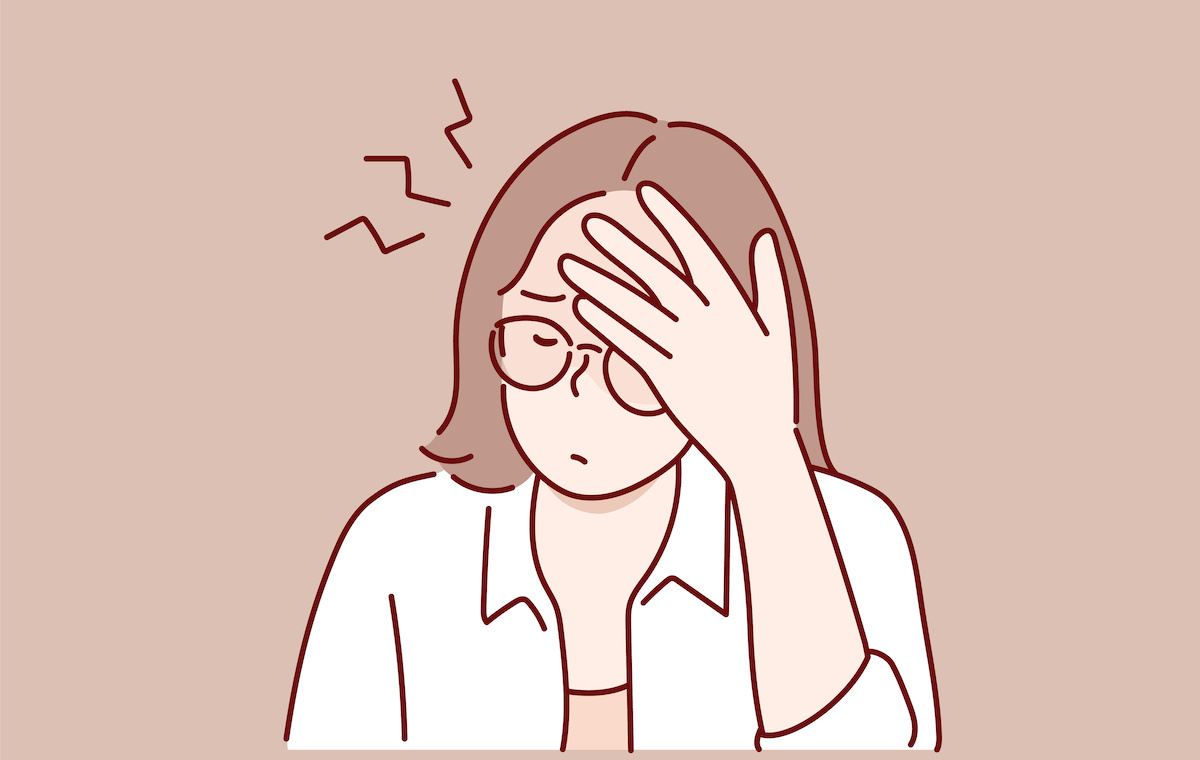 頭を押さえている人のイラスト