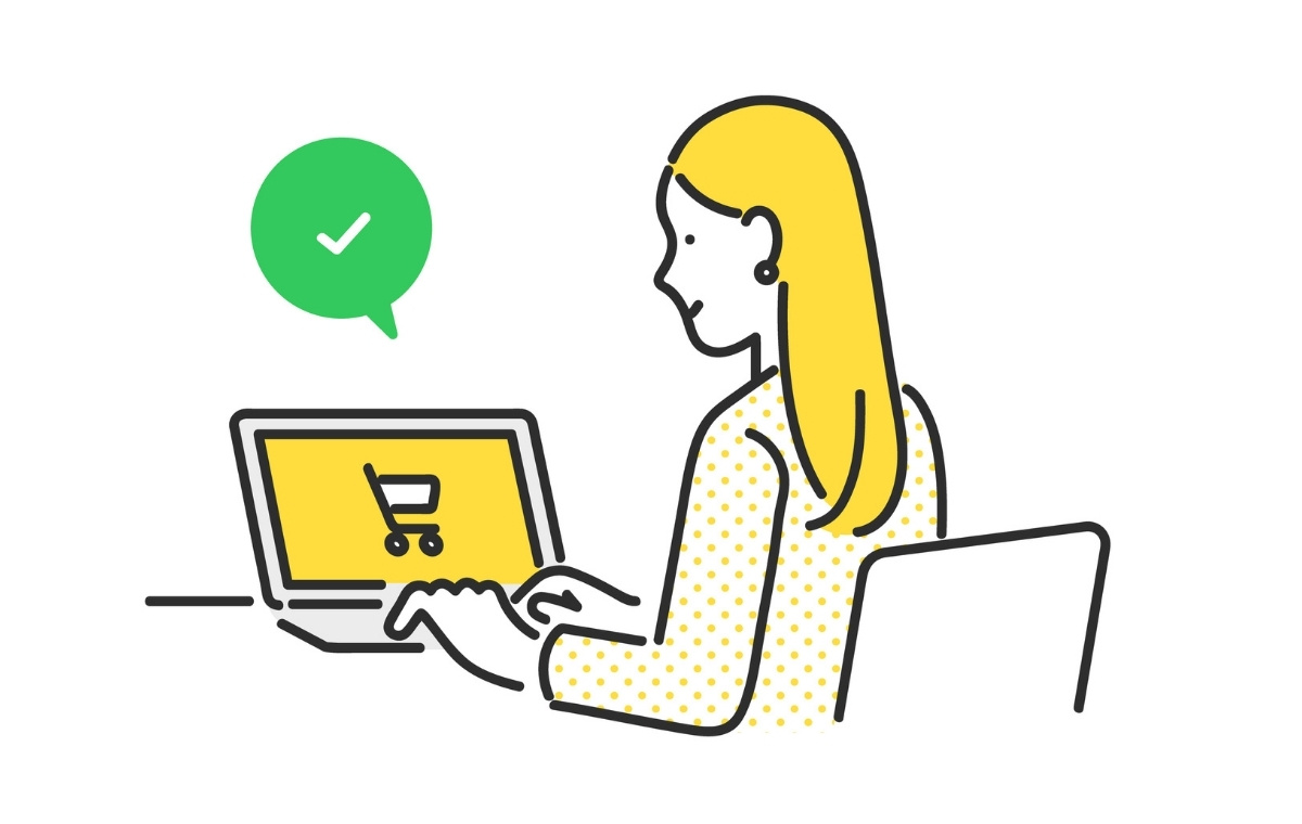パソコンでネットショッピングする女性のイラスト