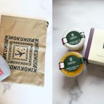 紀ノ国屋のポーチと千疋屋のスイーツの写真