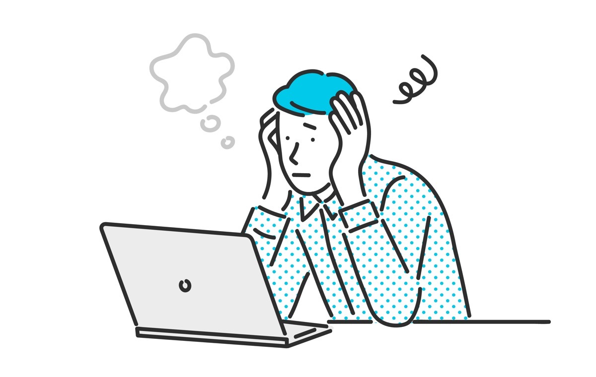 あたまをかかえる男性