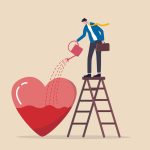 ハートに水やりする男性