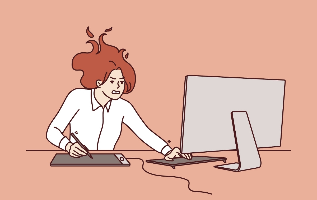 PC作業をしながら髪を逆立てて怒る女性のイラスト