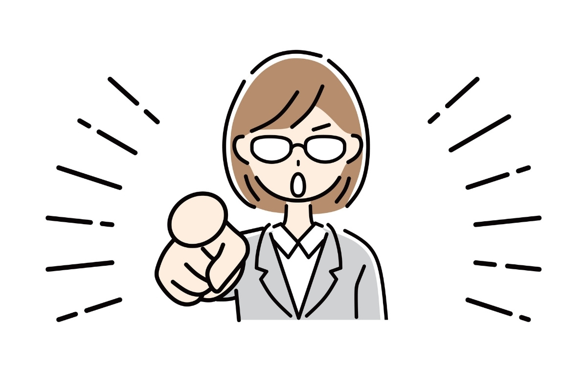 強い表情で指を指すビジネスウーマンのイラスト