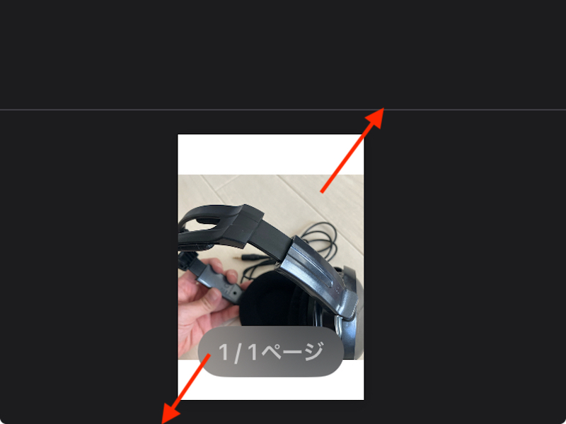 プリントプレビュー画面で、画面下部の写真を2本指でピンチアウト(拡大)する工程