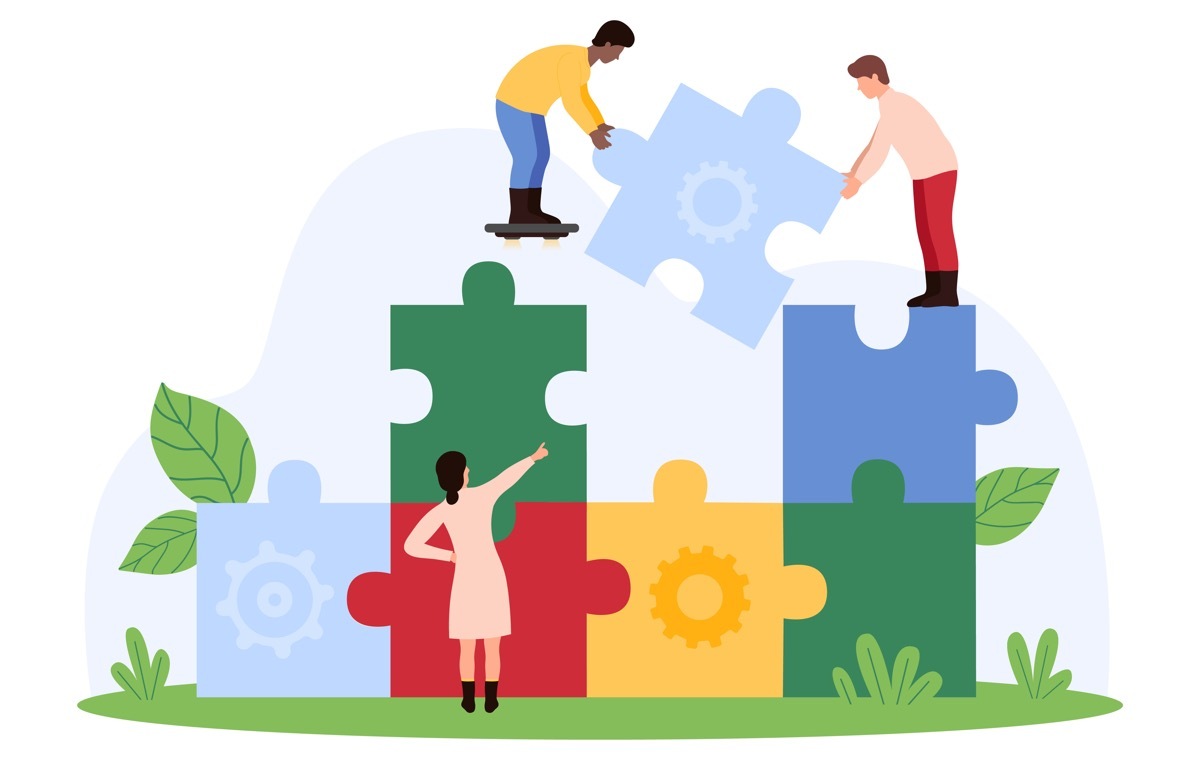 パズルを組み合わせる人たち