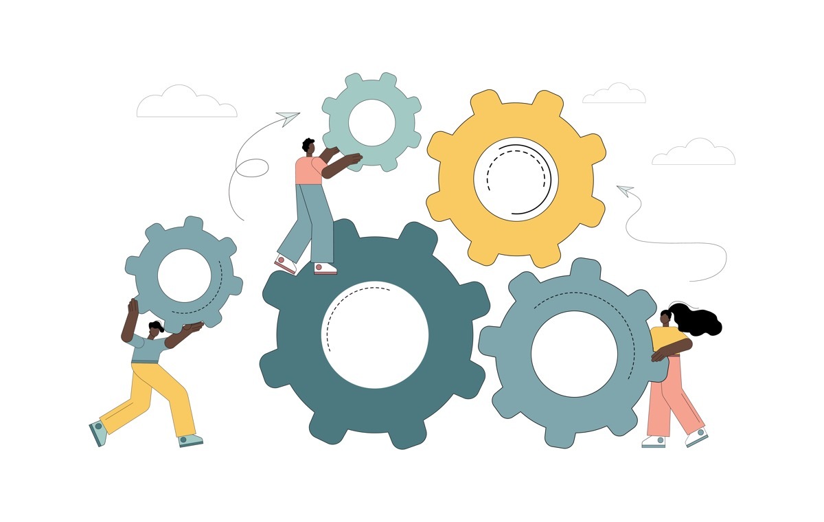 歯車を動かす男女