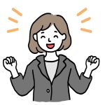 笑顔でガッツポーズする女性