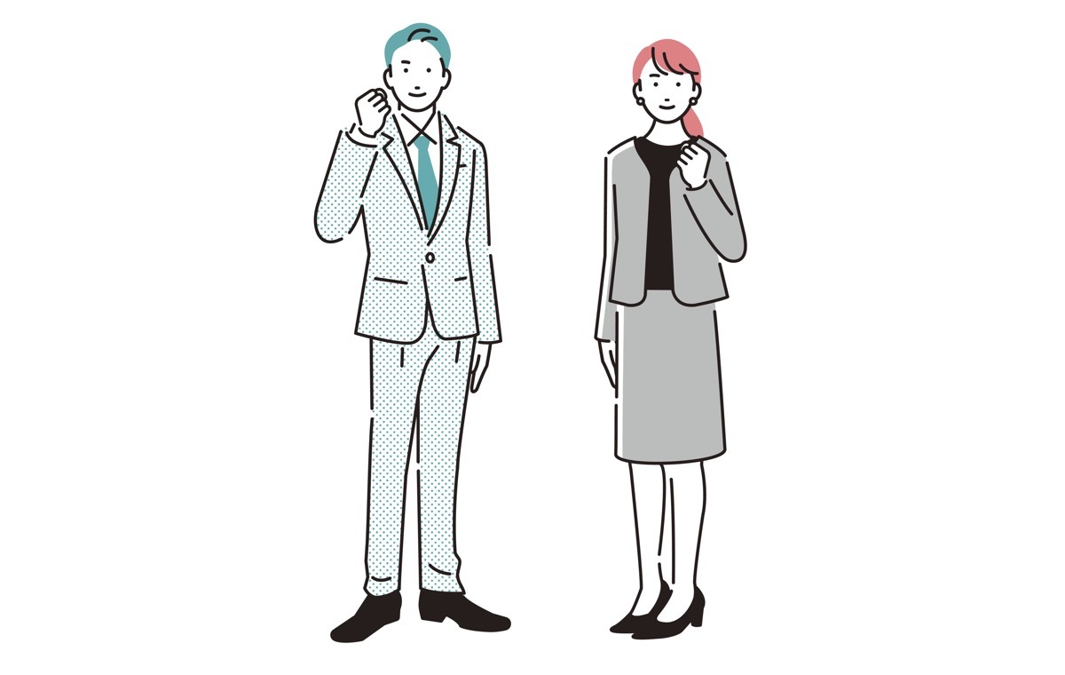 ガッツポーズする男女