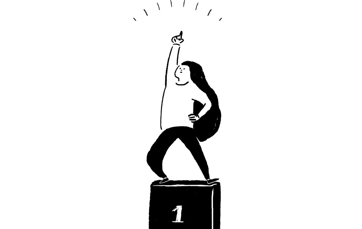 一位にのって指さす女性