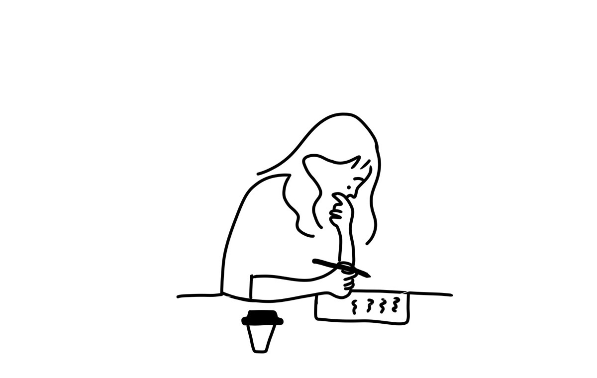 メモを取る女性