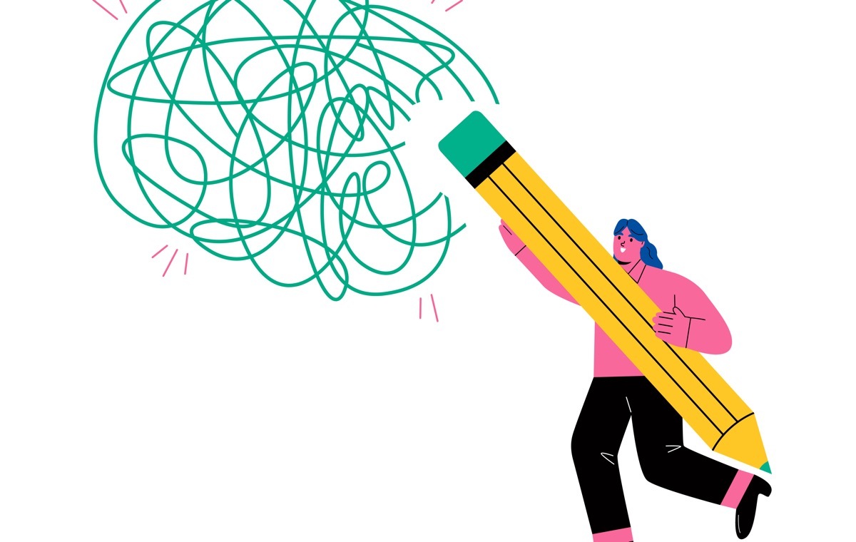 消しゴムで消す女性