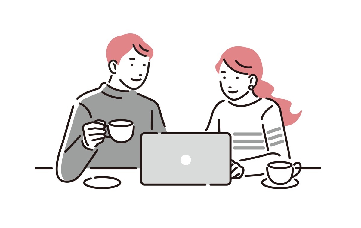 PC画面をみる男女