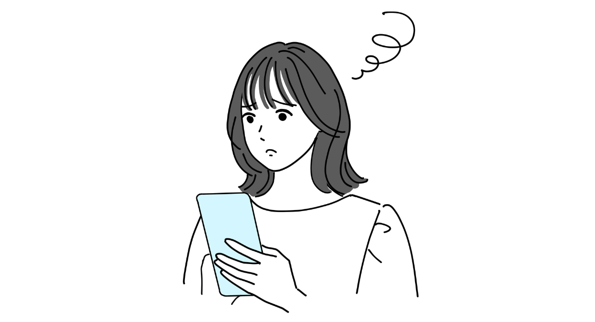 スマホを見ながら不機嫌そうな顔をしている女性のイラスト